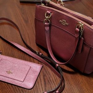 New COACH metallic rose gold purse